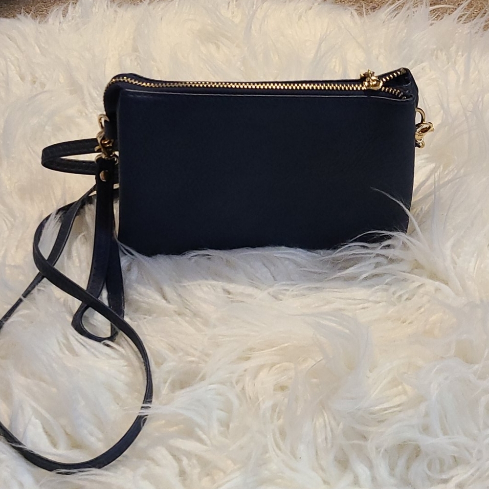Donated Pebble Leather Crossbody Wallet.